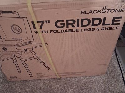 New still in box 17" Blackstone griddle with foldable legs & shelf.