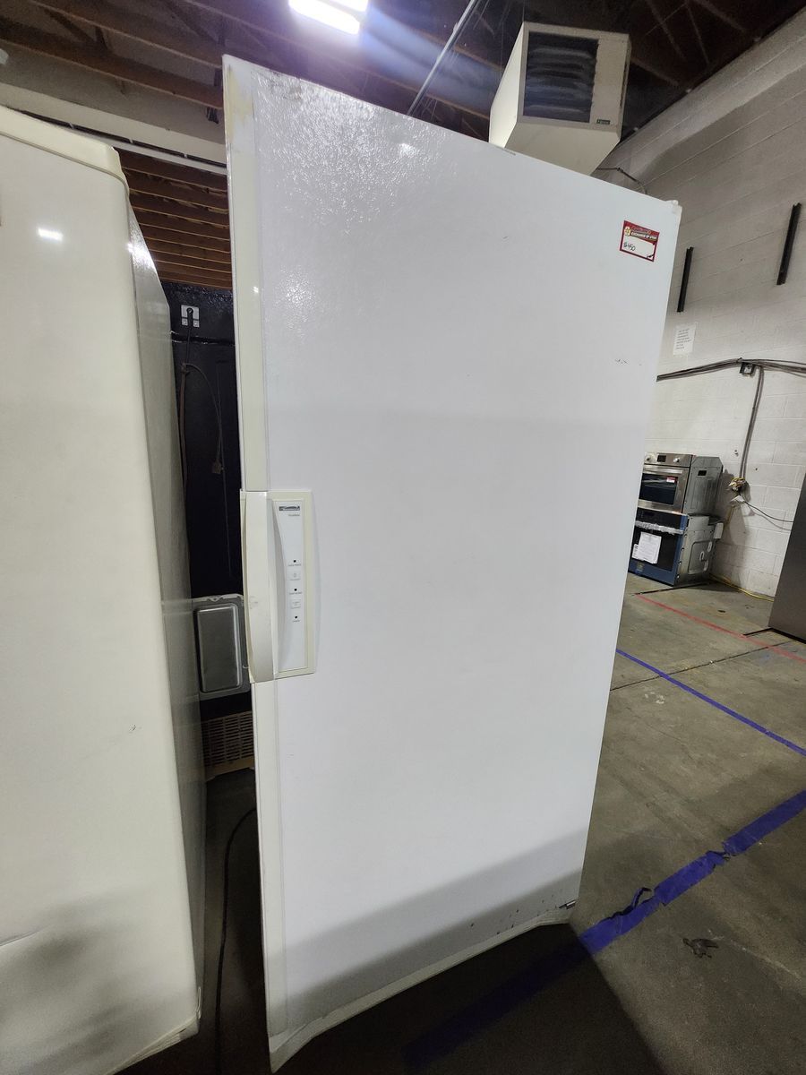White Upright Commercial Stand-Up Freezer with Wire Shelving and Baskets