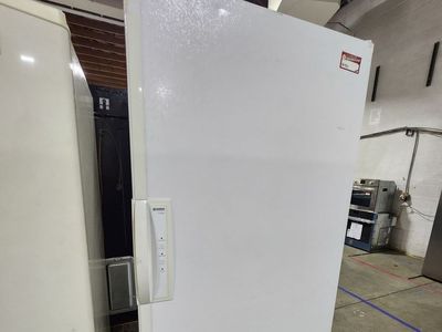 White Upright Commercial Stand-Up Freezer with Wire Shelving and Baskets