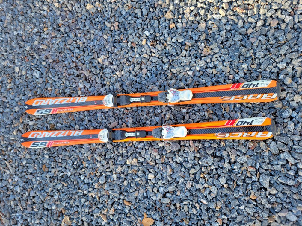 blizzard G5 140cm skis, boots avail too