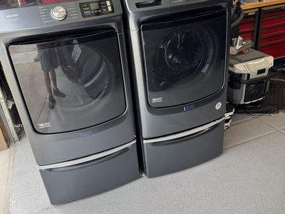 Maytag Pet Pro front load washer and gas dryer with Pedestals, midnight steel color
