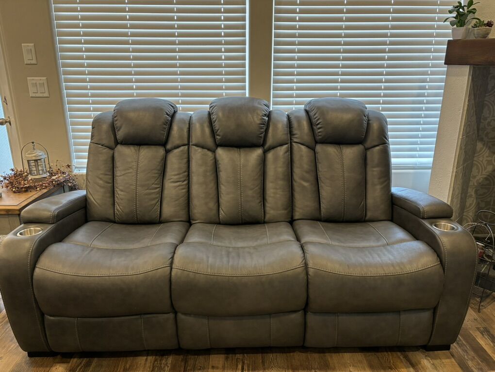 Excellent condition. Gray Leather Couch