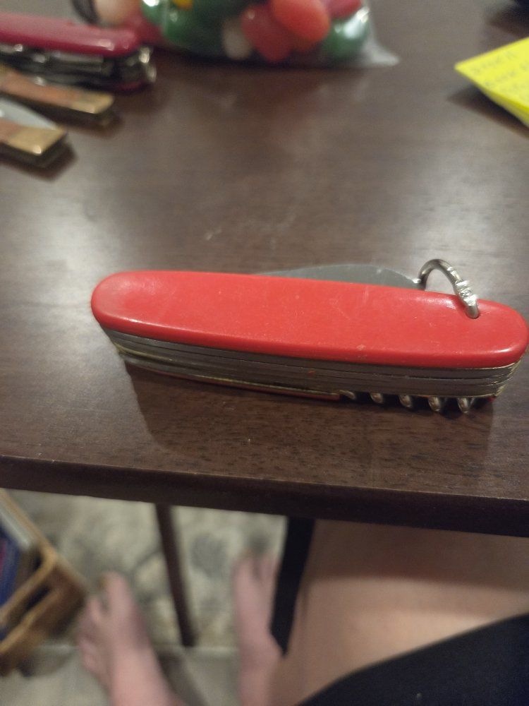 Swiss Army Knife with Saw, Corkscrew, and Can Opener - Red Multi-tool