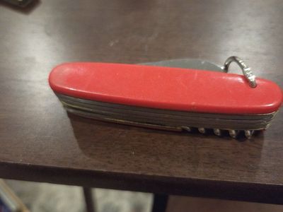 Swiss Army Knife with Saw, Corkscrew, and Can Opener - Red Multi-tool