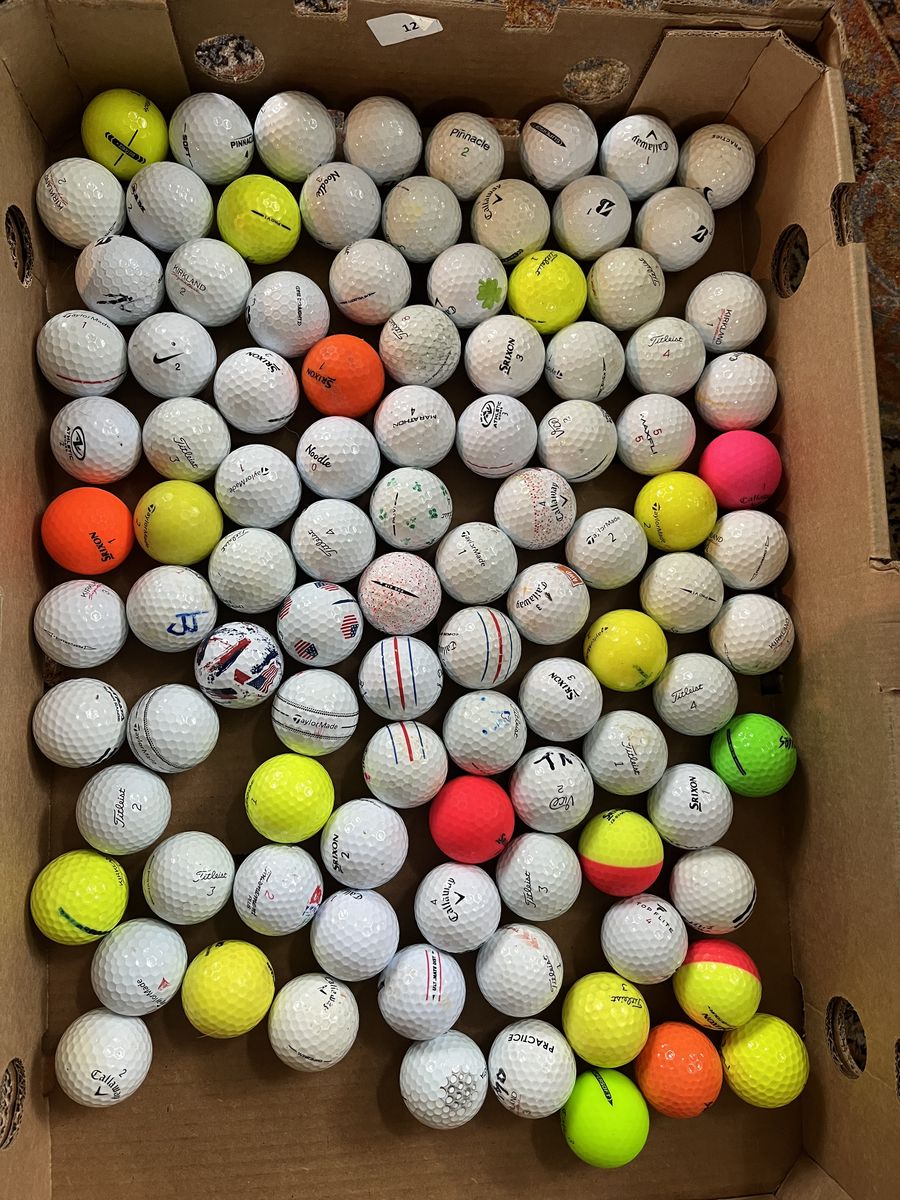100 used golf balls