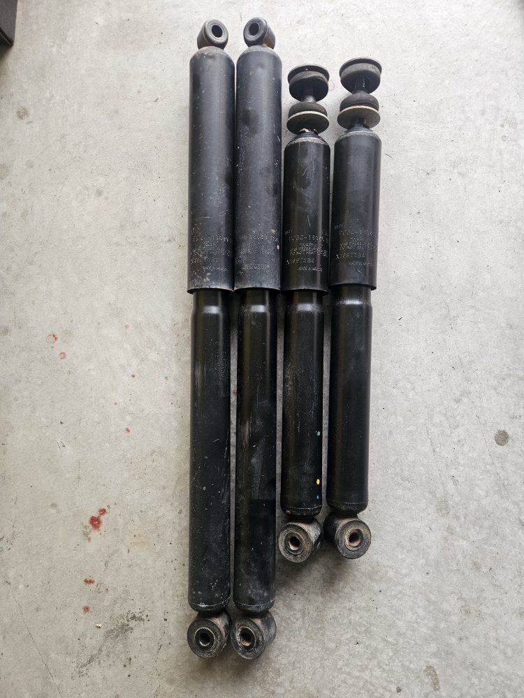 Set of 4 OEM Ford FoMoCo Shocks and Struts PC3C-18080 / PC3C-18045