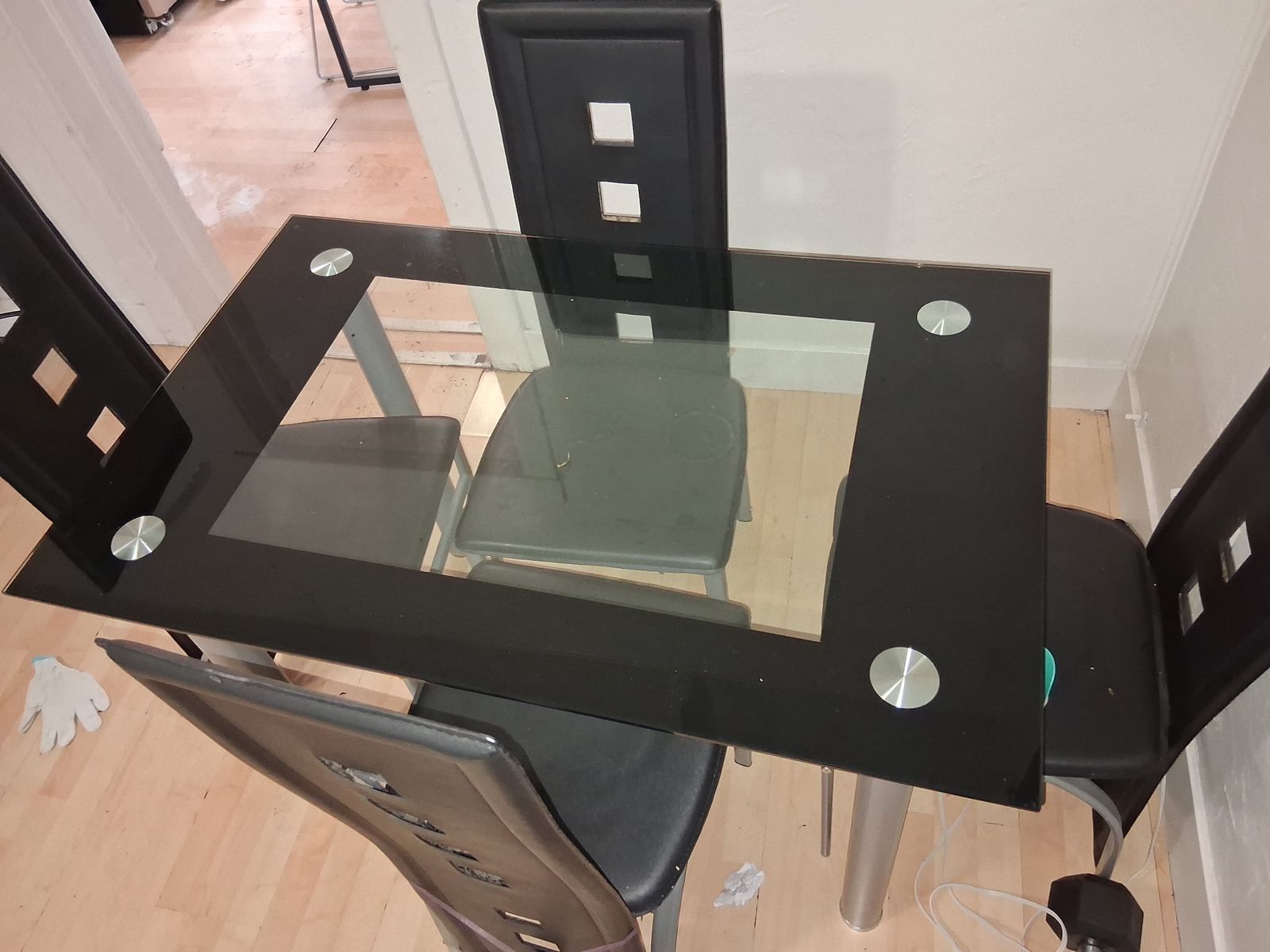 Glass table with chairs.