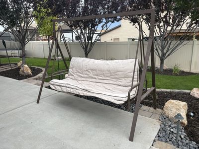 Outdoor Patio Swing with Tan Cushions - Used