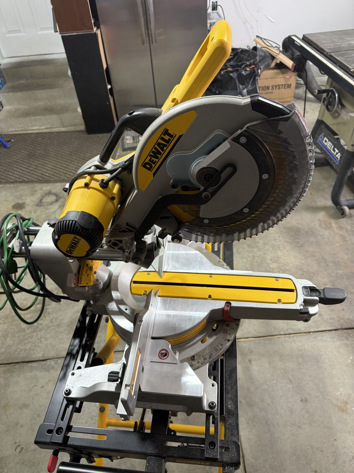 Dewalt DWS779 double bevel compound miter saw w/60” rolling miter saw stand