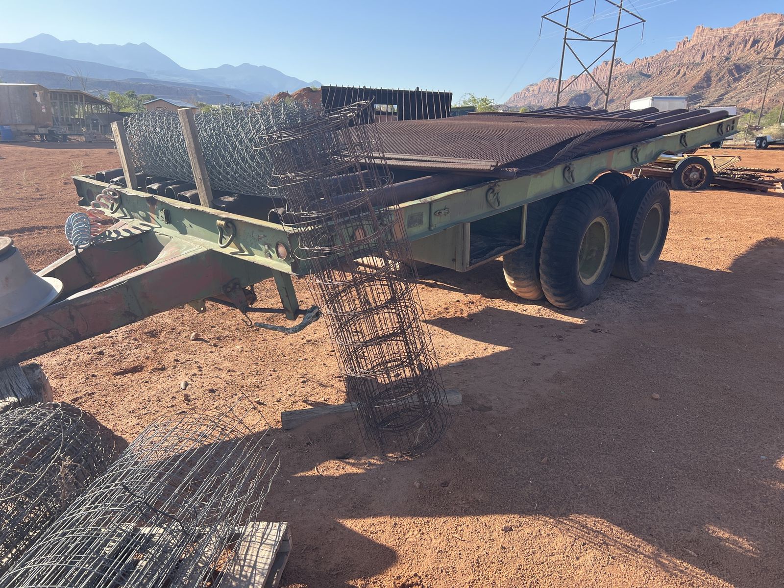 Heavy-Duty Flatbed Trailer - Industrial Grade Utility Trailer with Quad Axle Design
