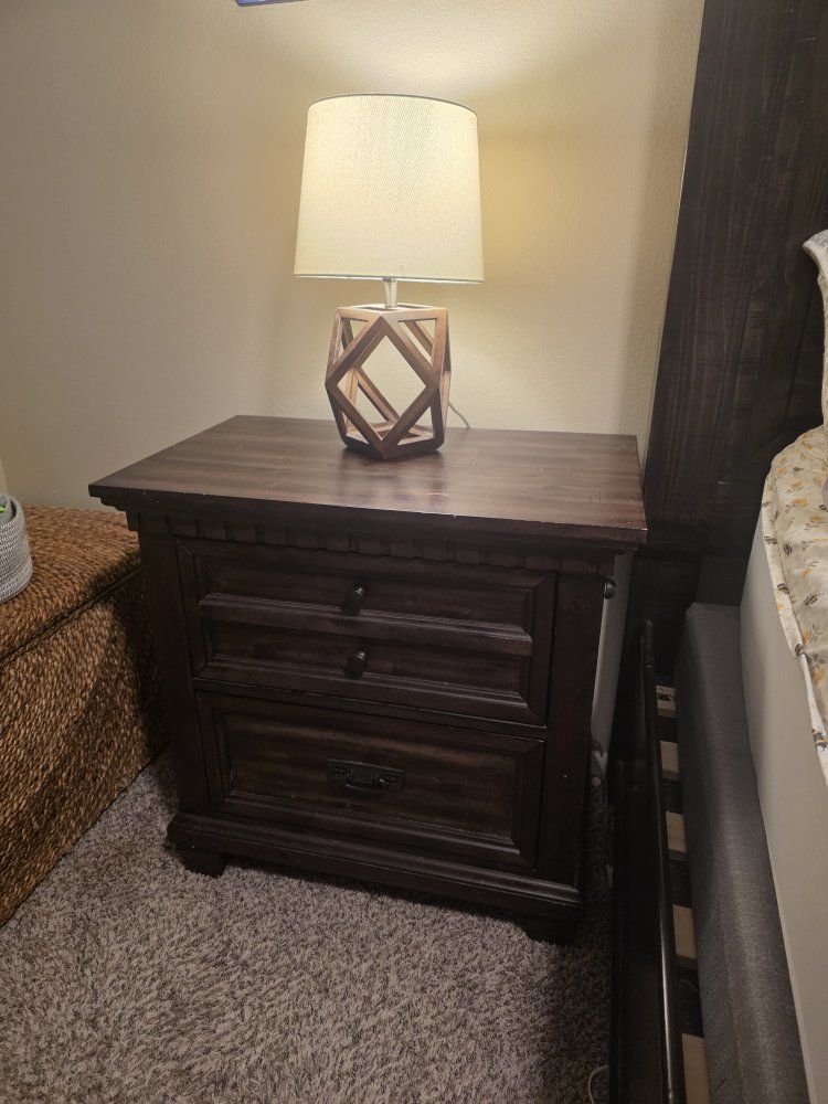 Dark Wood Nightstand with Multiple Drawers