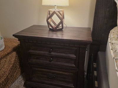 Dark Wood Nightstand with Multiple Drawers