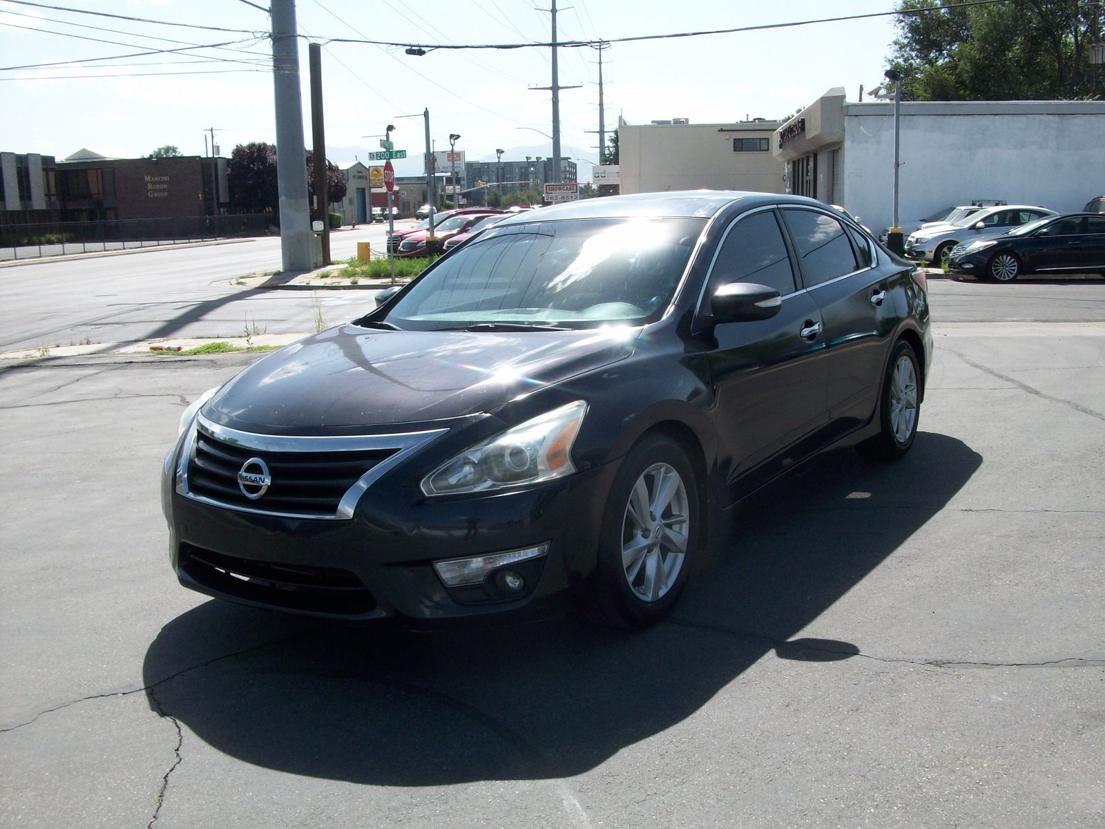 2014 Nissan Altima 2.5 SL — rebuilt & branded title, 9% below market