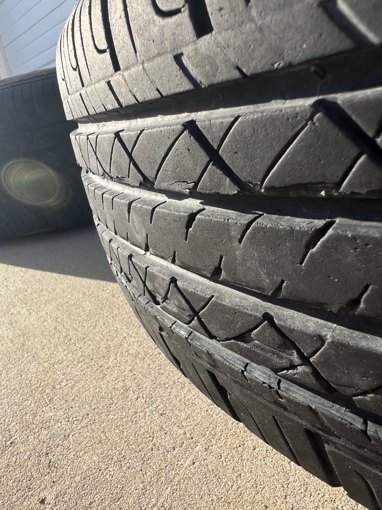 Set of 4 Drag DR-19 Black Alloy Wheels with 185/65R15 GT Radial Tires.