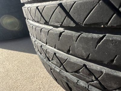 Set of 4 Drag DR-19 Black Alloy Wheels with 185/65R15 GT Radial Tires.