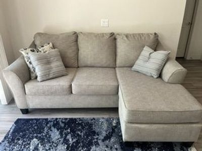 Couch with chaise lounge