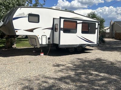 Forest River Cherokee Fifth Wheel Travel Trailer with Slide-Out and awning