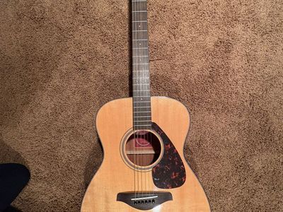 Yamaha FG 700S Acoustic Guitar with case, guitar stand, capo, music stand and book