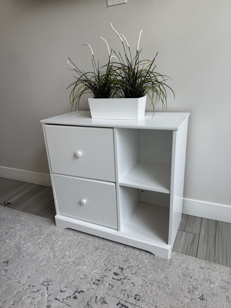 White 2-drawer storage unit with shelves Great for toys, books, or clothes
