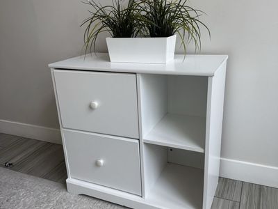White 2-drawer storage unit with shelves Great for toys, books, or clothes