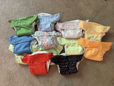 14 Bum Genius cloth diapers + inserts