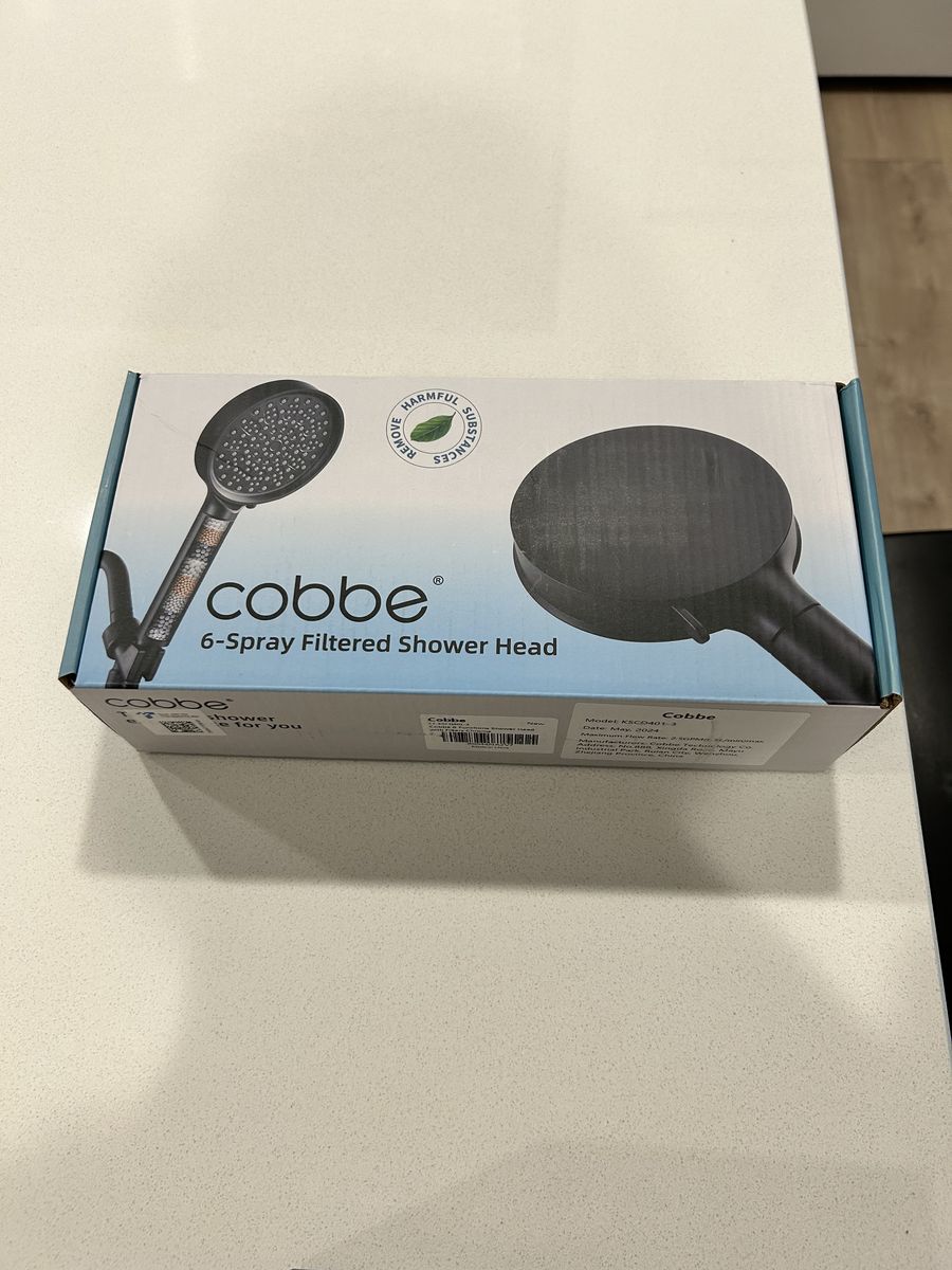 Brand new hand held shower head (in box)