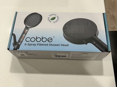 Brand new hand held shower head (in box)