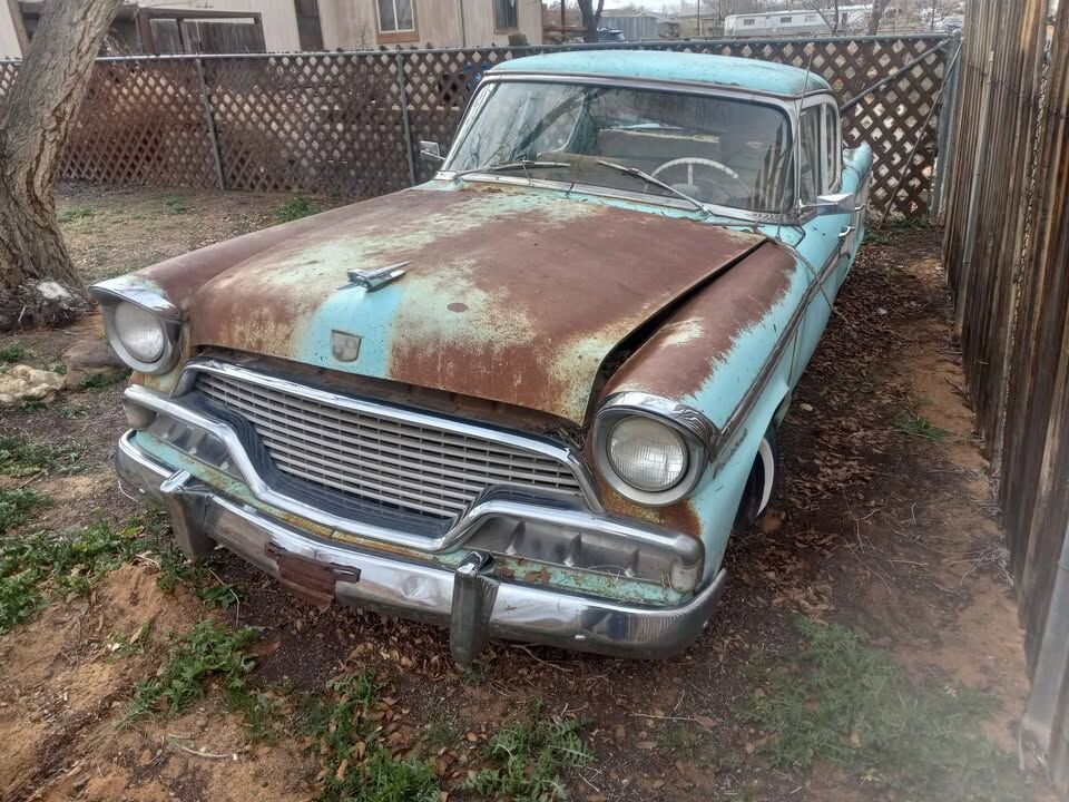1956 Studebaker President Sedan Pretty Girl with a Dirty Face .