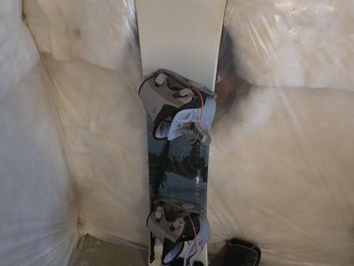Ambient Snowboard with Bindings and Boots.