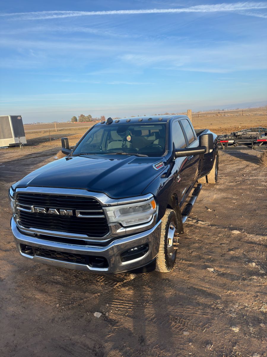 2021 RAM 3500 Big Horn — rebuilt & branded title, 11% below market