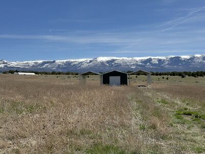 7 Acres with outbuilding, septic and Water Right Included