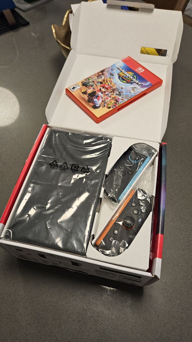 Nintendo Switch 2 Bundle + Mario Kart World (Excellent) no trades