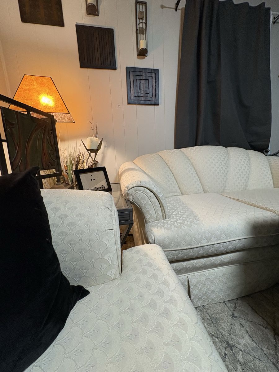 Beautiful Cream colored couch and loveseat with shell pattern. Like new in a formal room barely used.