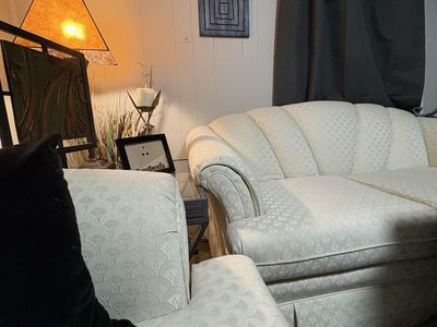 Beautiful Cream colored couch and loveseat with shell pattern. Like new in a formal room barely used.
