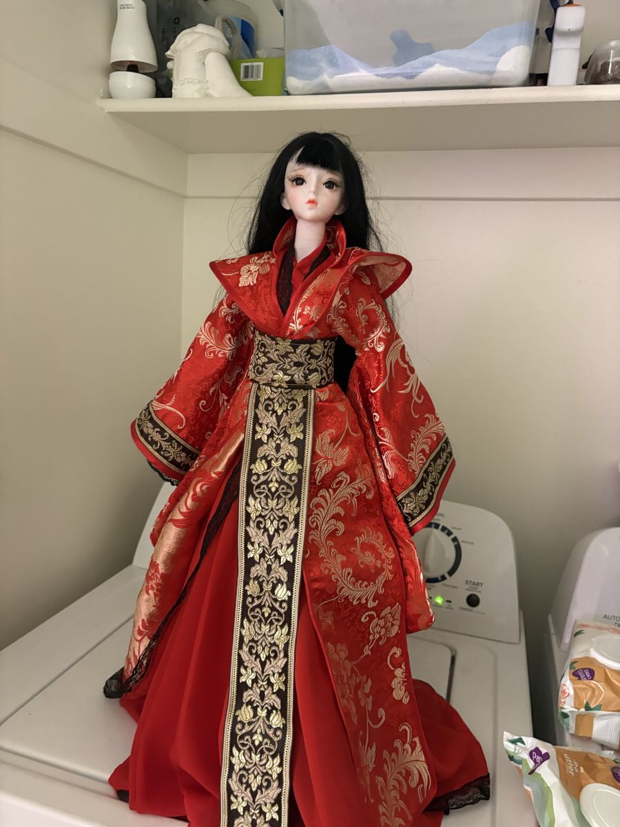 Porcelain doll with stand