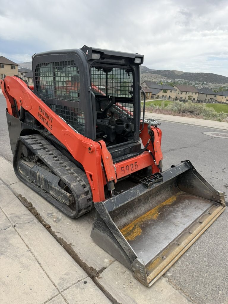 Medium Size Track Skid for Rent - Kubota SVL65 with Enclosed Cab