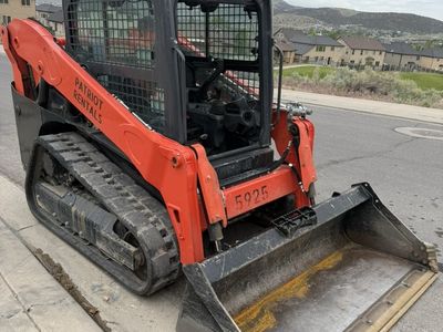 Medium Size Track Skid for Rent - Kubota SVL65 with Enclosed Cab