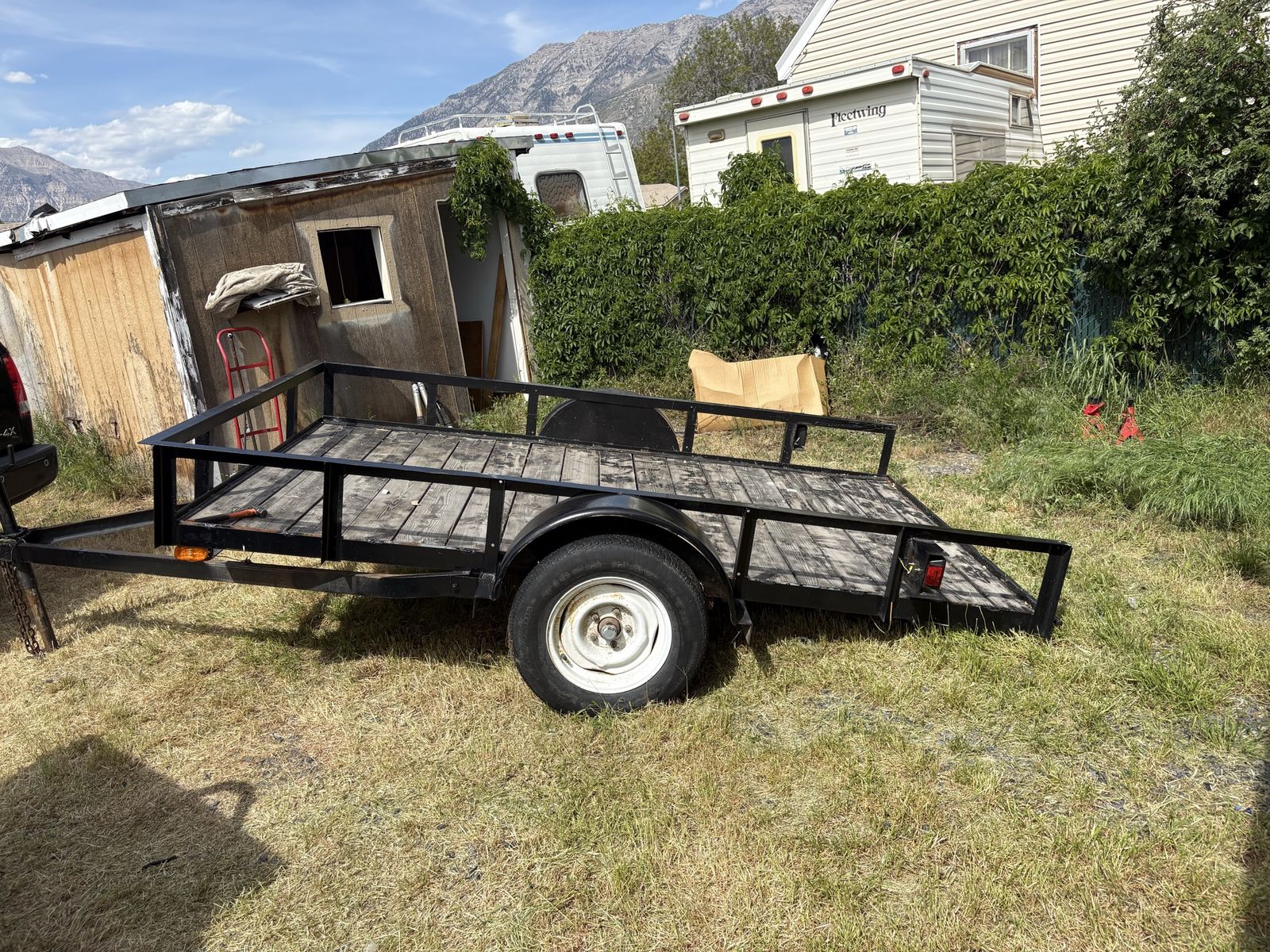 Tilt bed trailer