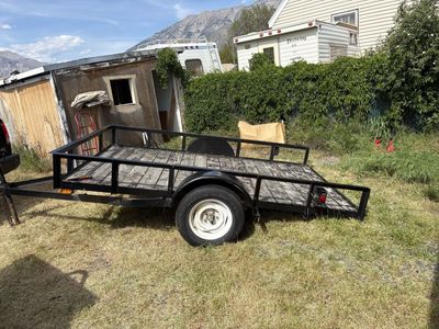 Tilt bed trailer