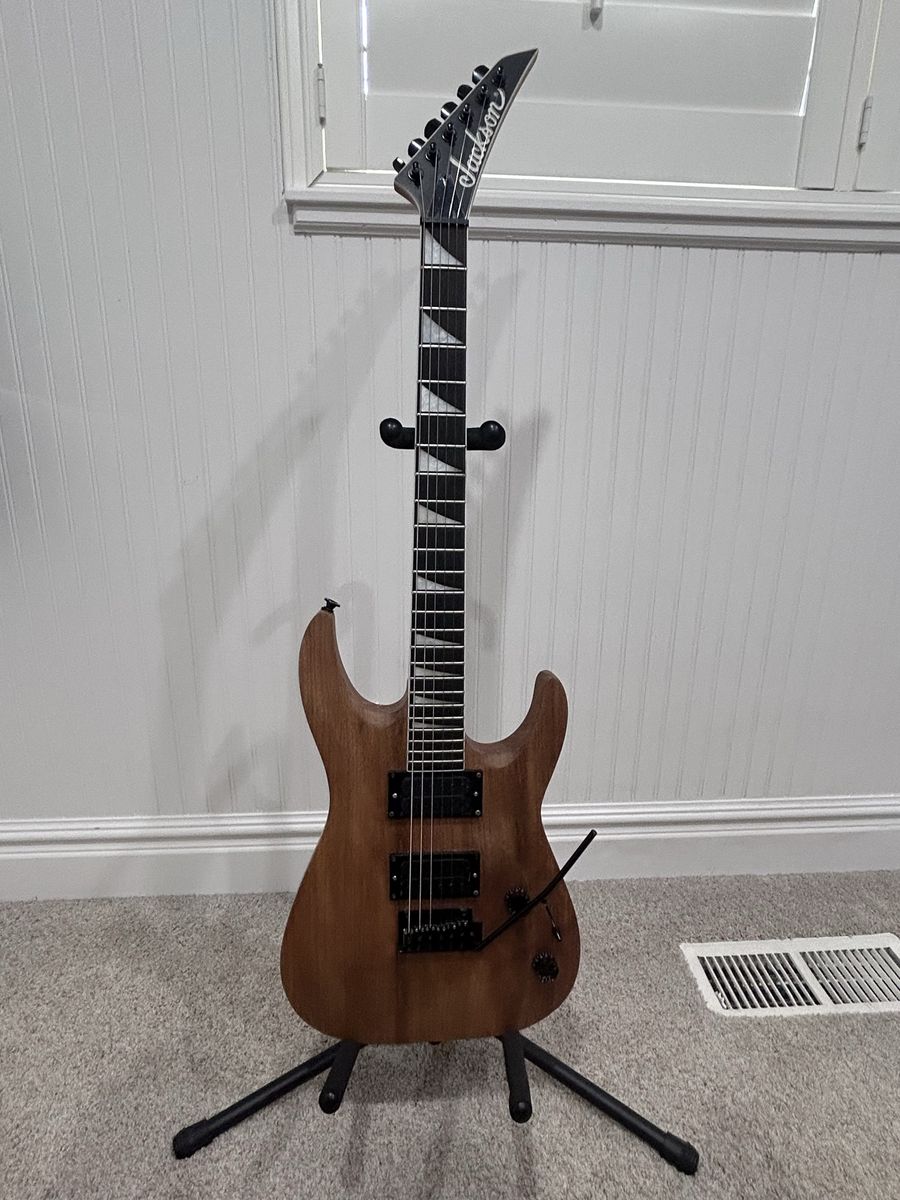 Jackson Electric Guitar - Brown, 6-String, Tremolo Bar, Pointed Headstone -Natural Color