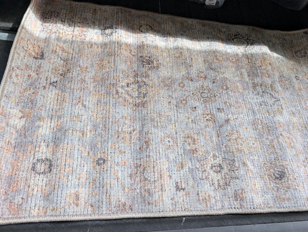 New 27in by 45in Machine Woven Rug