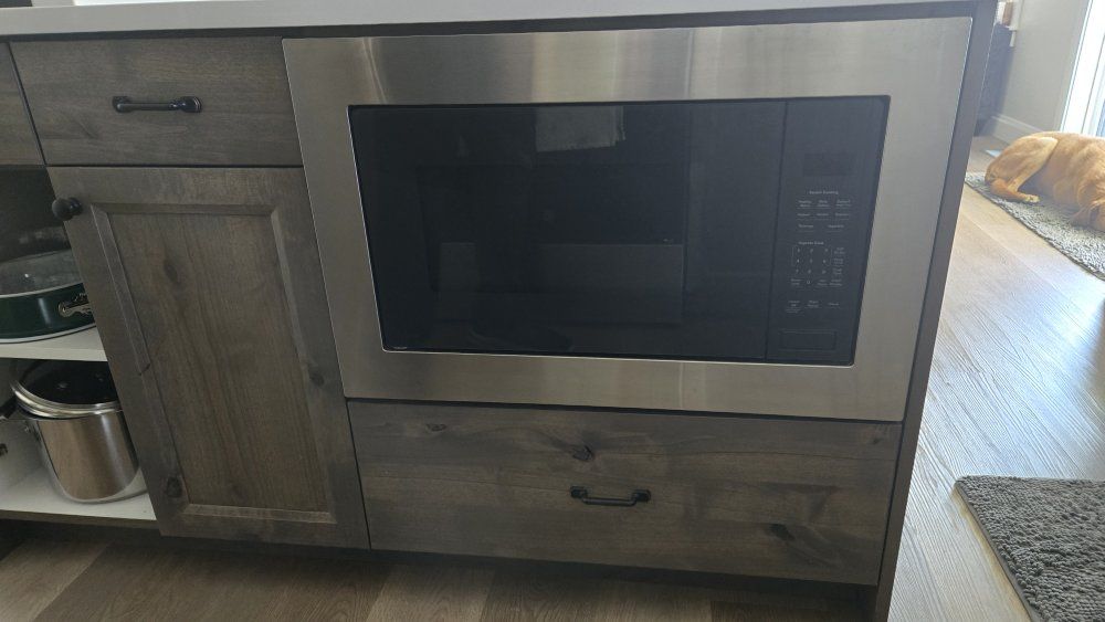 GE Profile on counter or built in microwave.