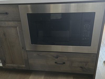 GE Profile on counter or built in microwave.