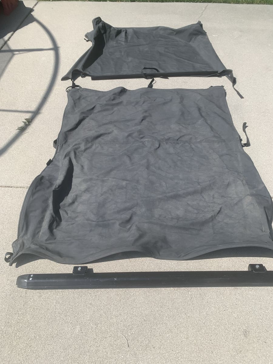 Unbranded Black Soft Top Roof & Rail System for 2000 Jeep Wrangler (Used). Includes back seat area cover.