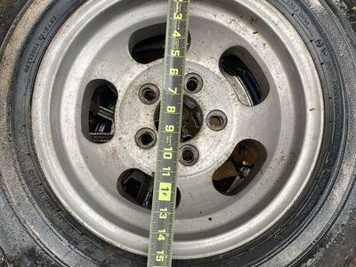 Used Wheel and Tire Assembly with Slotted Alloy Rim 15 inch