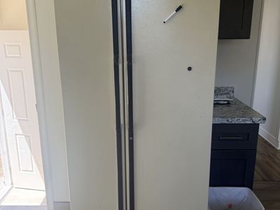 FREE. GE Side-by-Side Refrigerator - White/Bisque - Reliable Kitchen Appliance