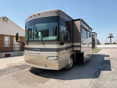 2005 Winnebago Journey 34H Pusher with 2 slides