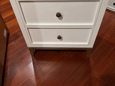 White Modern Two-Drawer Nightstand with Gold Hardware and Legs
