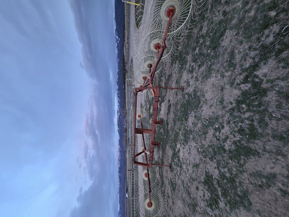 large old hay rake