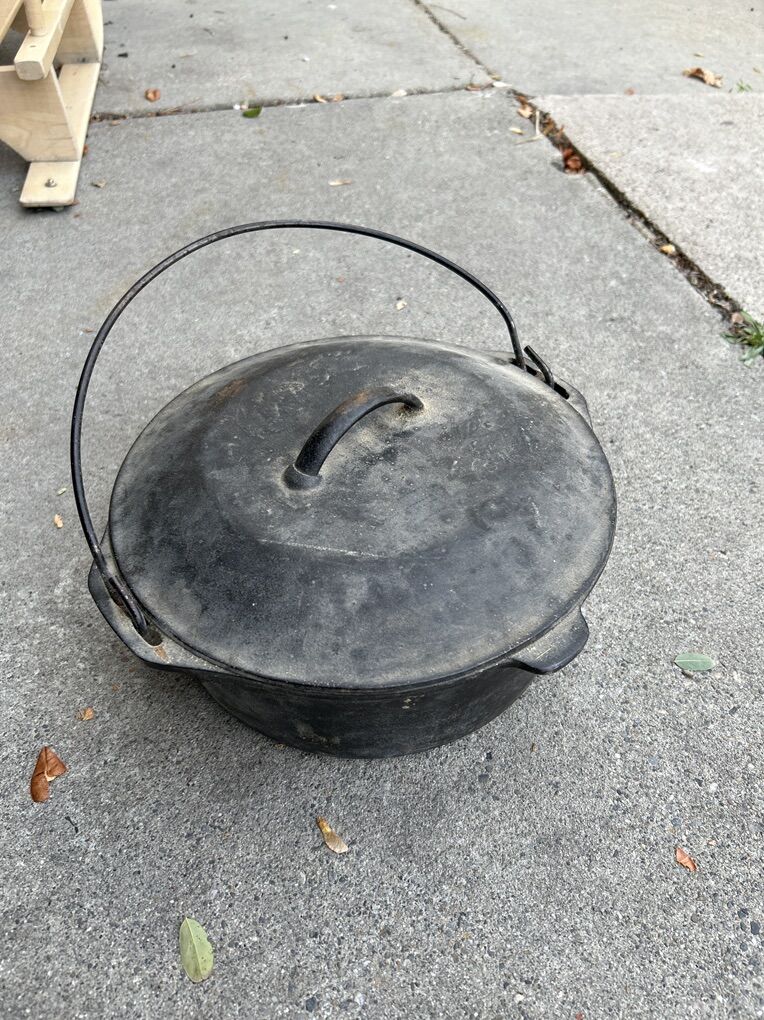 BTG. Cast Iron 10 1/4 No. 8 Dutch Oven With Lid.